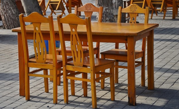 A wooden dining table and chairs