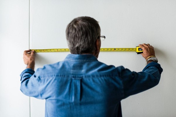 man with measuring tape