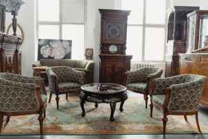 antique tables and upholstered chairs