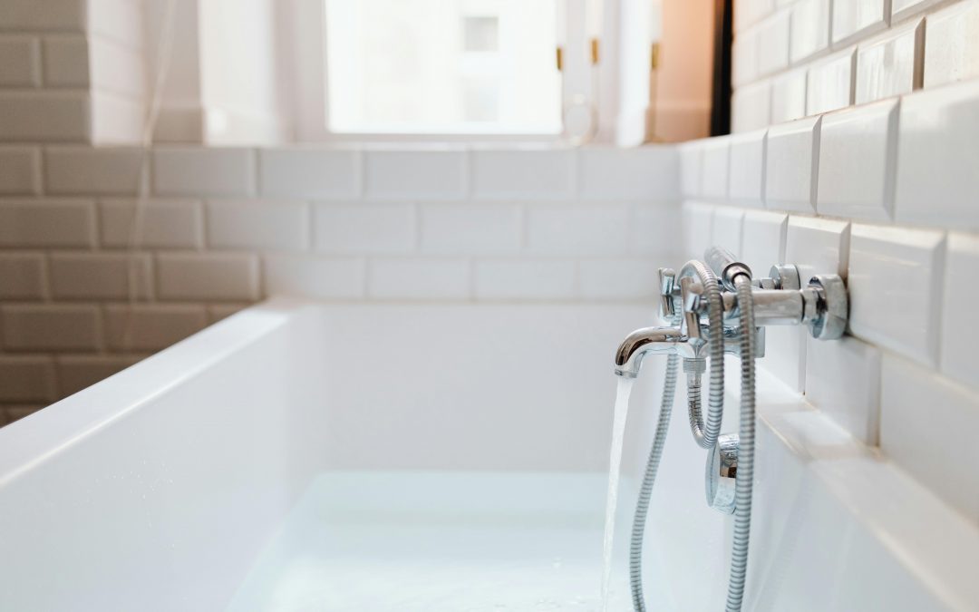 white sink with chrome faucet