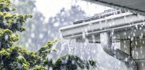 rain falling into gutter