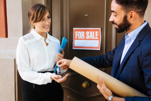 woman taking keys from man