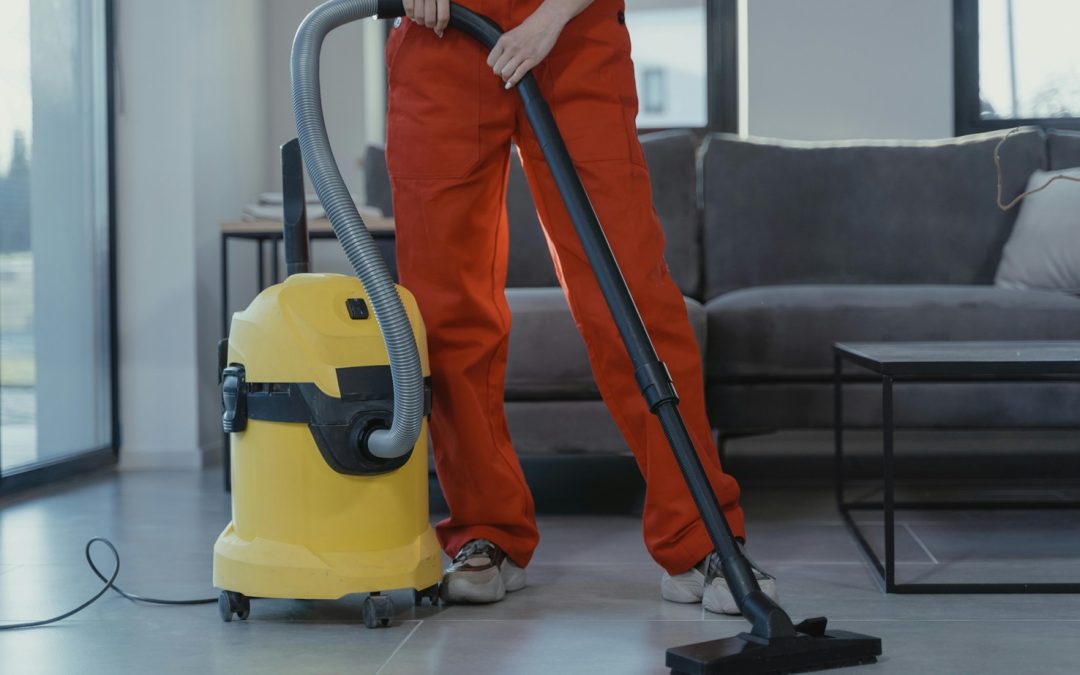 house cleaner running vacuum