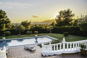 built in pool with view and landscaping