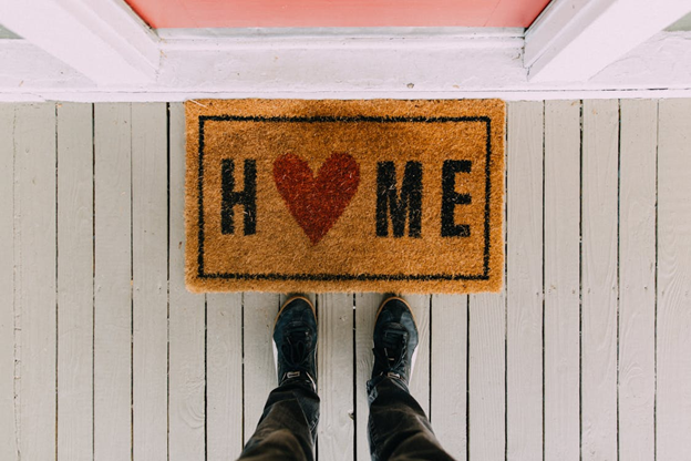 welcome mat says welcome