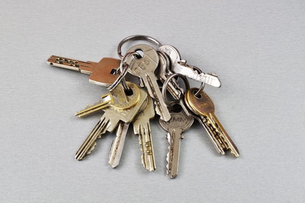 keyring holding several metal keys