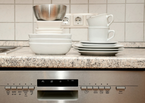 dishes ready to be loaded into dishwasher