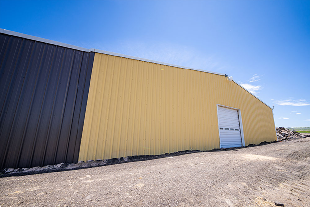 yellow steel barn