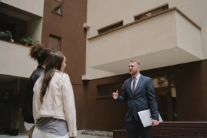 young couple meeting with mortgage broker