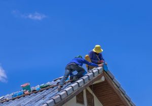 roofer making repairs