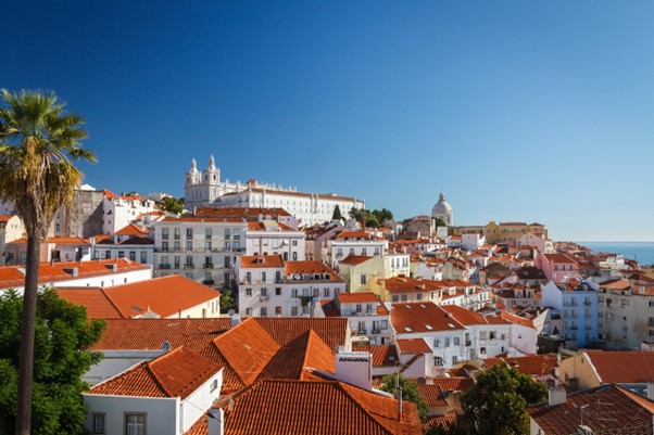 many house with clay tile roofs