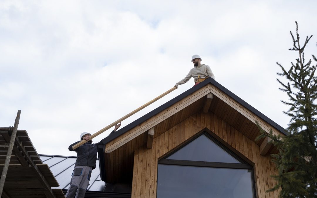 two men working on roof