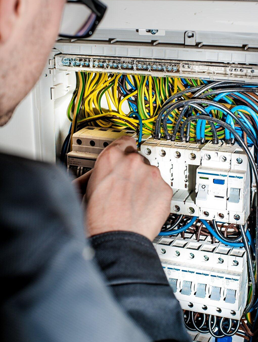 electrician making wiring repairs