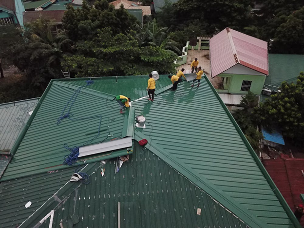 green metal roofing on commercial building