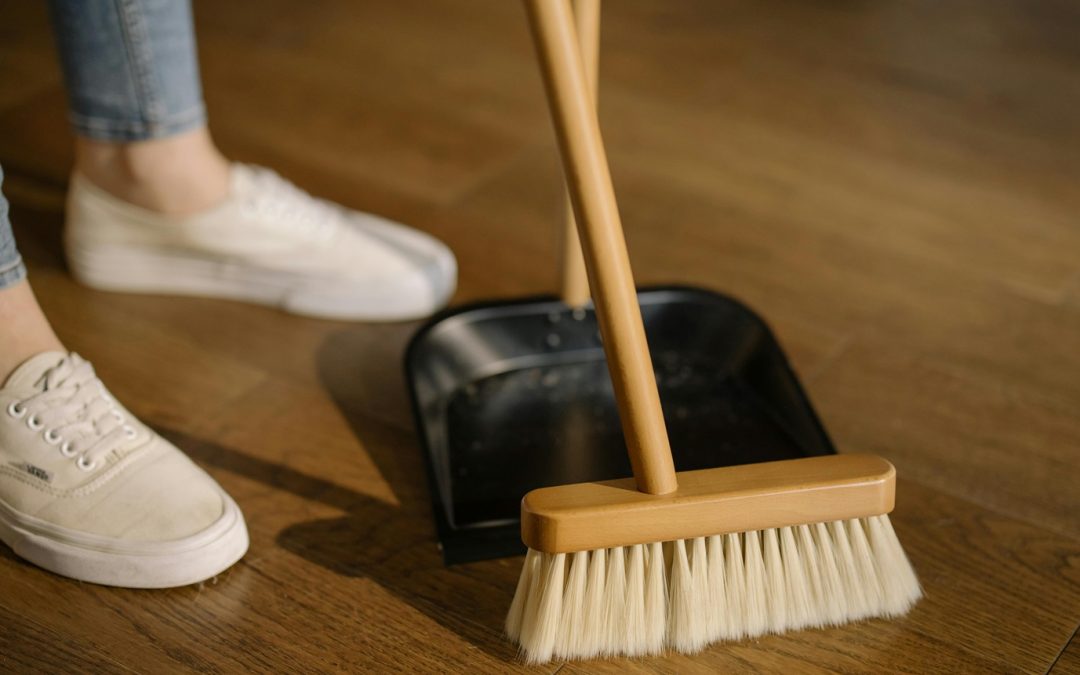 house cleaner sweeping floor