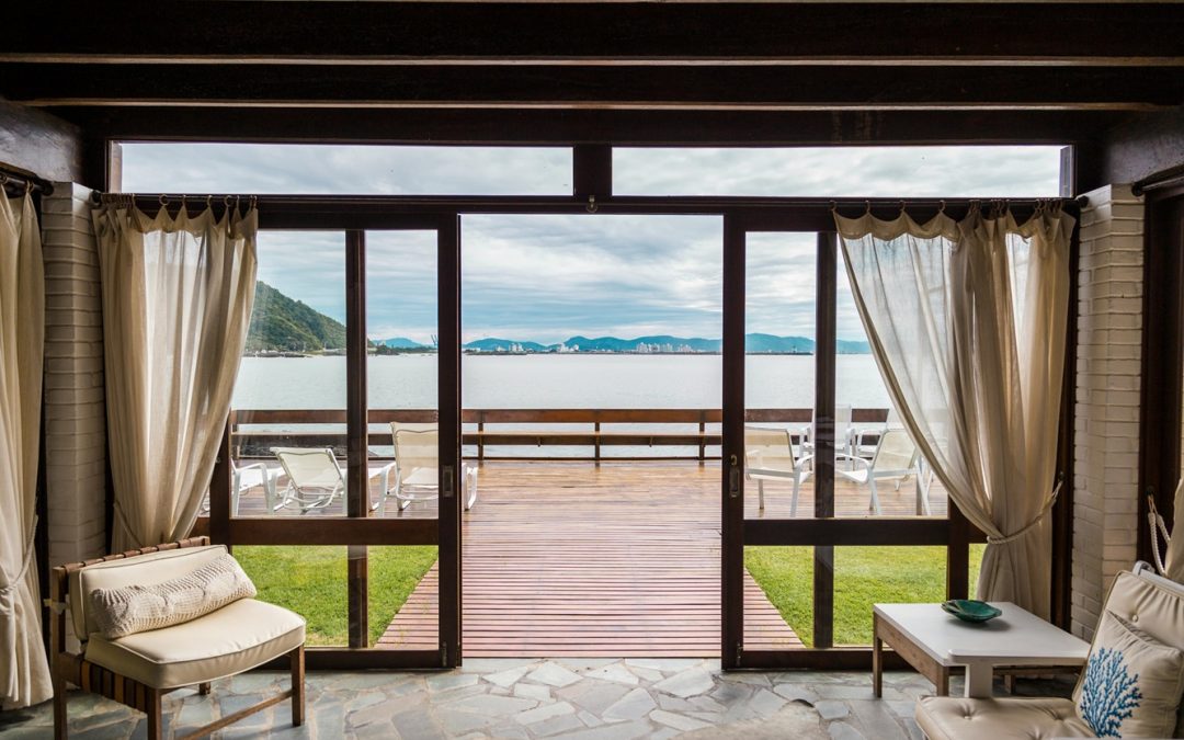 patio doors with view of water