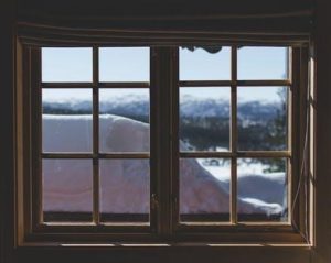 looking out windows at snow