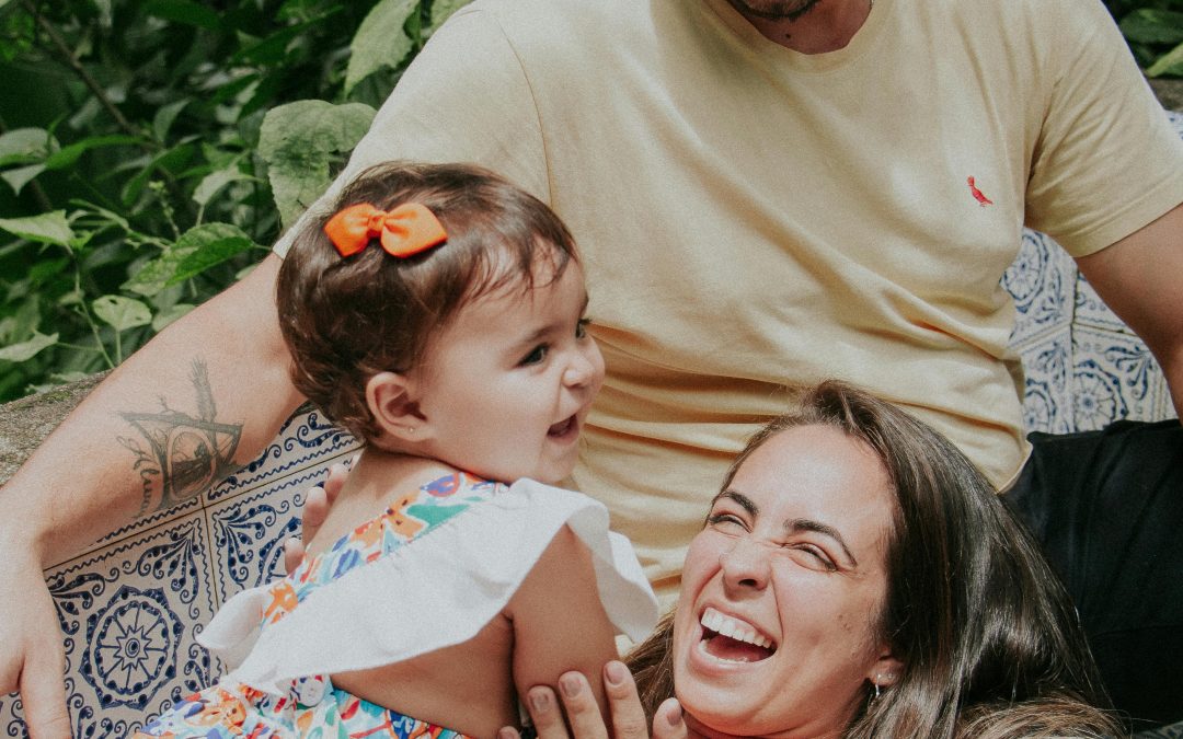 image of a family sitting together embracing eachother