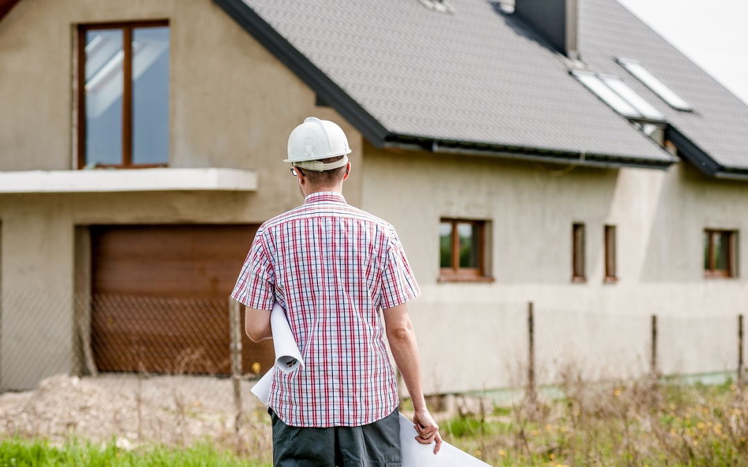 architect walking towards house