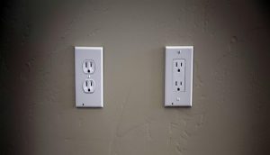 two types of electric outlet covers