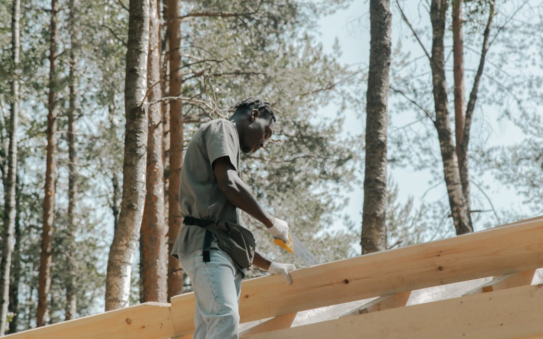 man working on roof