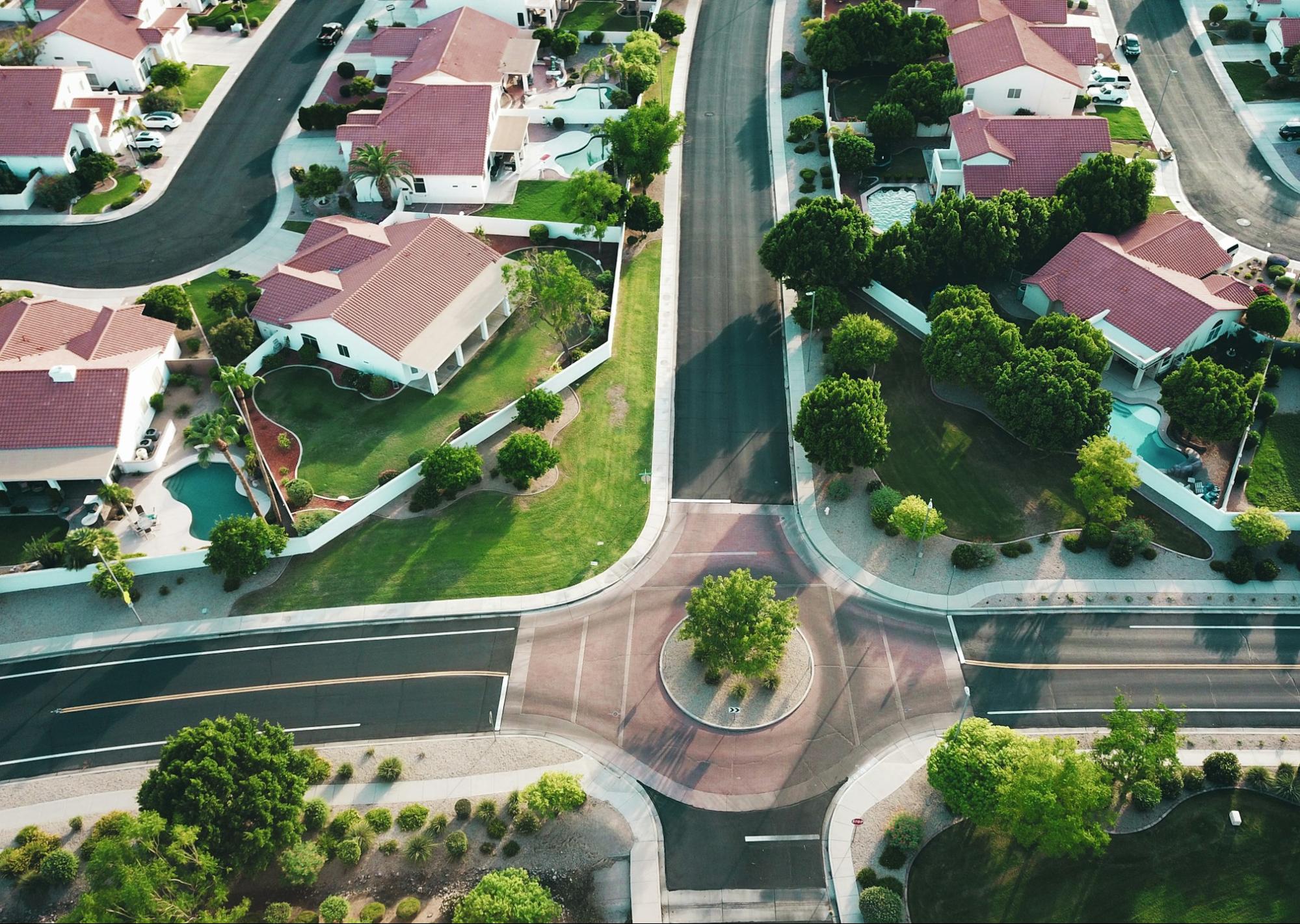 overhead image of an intersection in a nice neighborhood