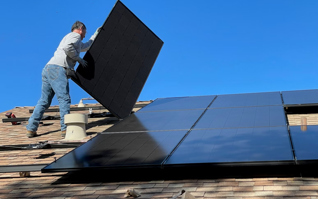 Solar panels being installed on the roof