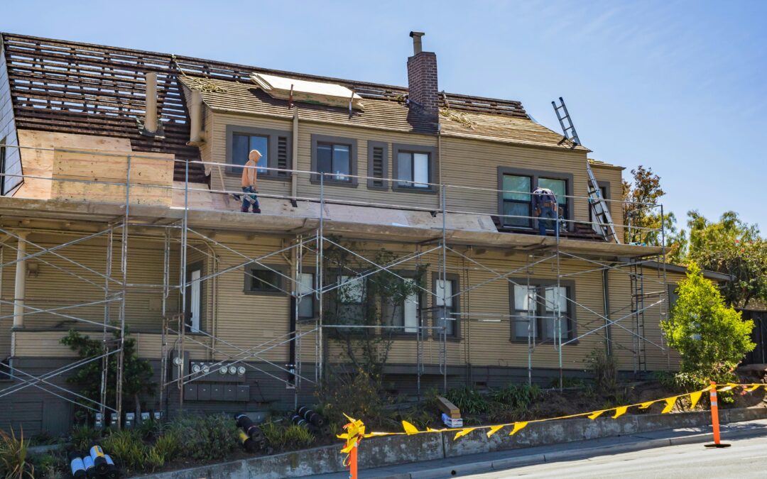 business having roofing work done by scaffolding