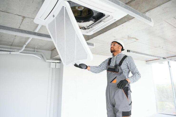 man doing hvac work