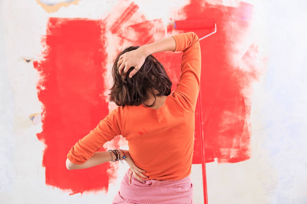 Woman making home improvement and having problems