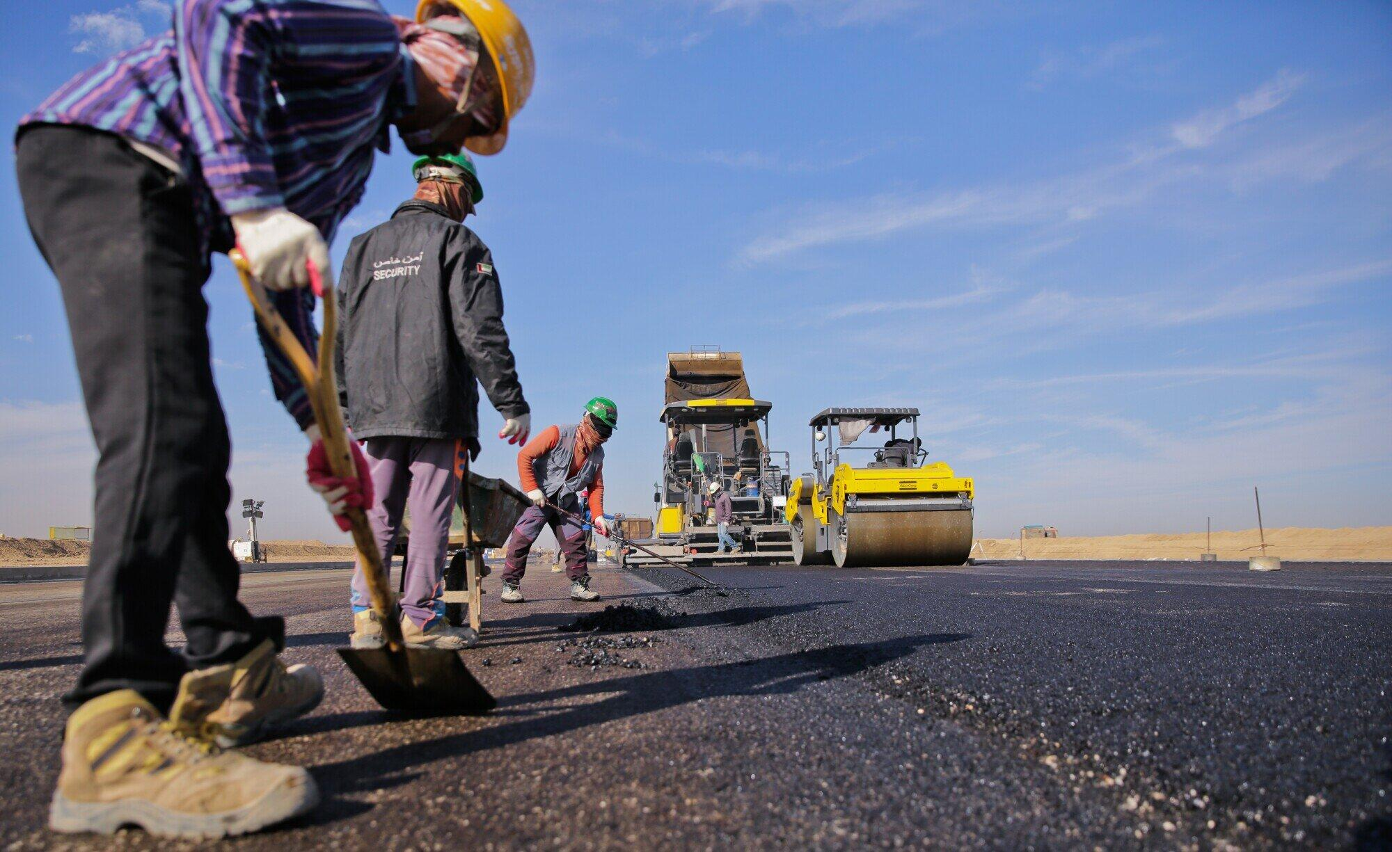 road-work men working on road