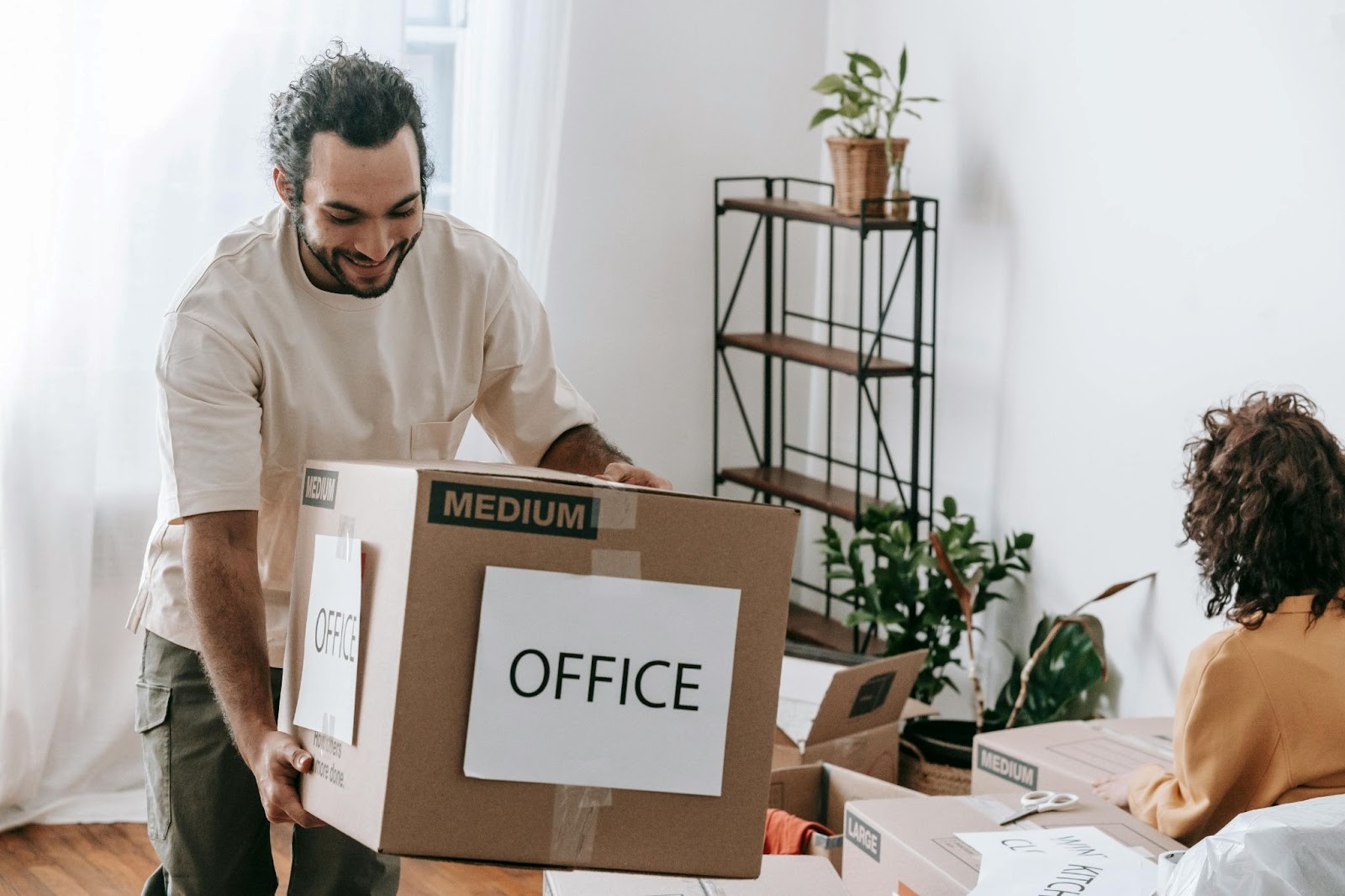 moving boxes couple packing moving boxes