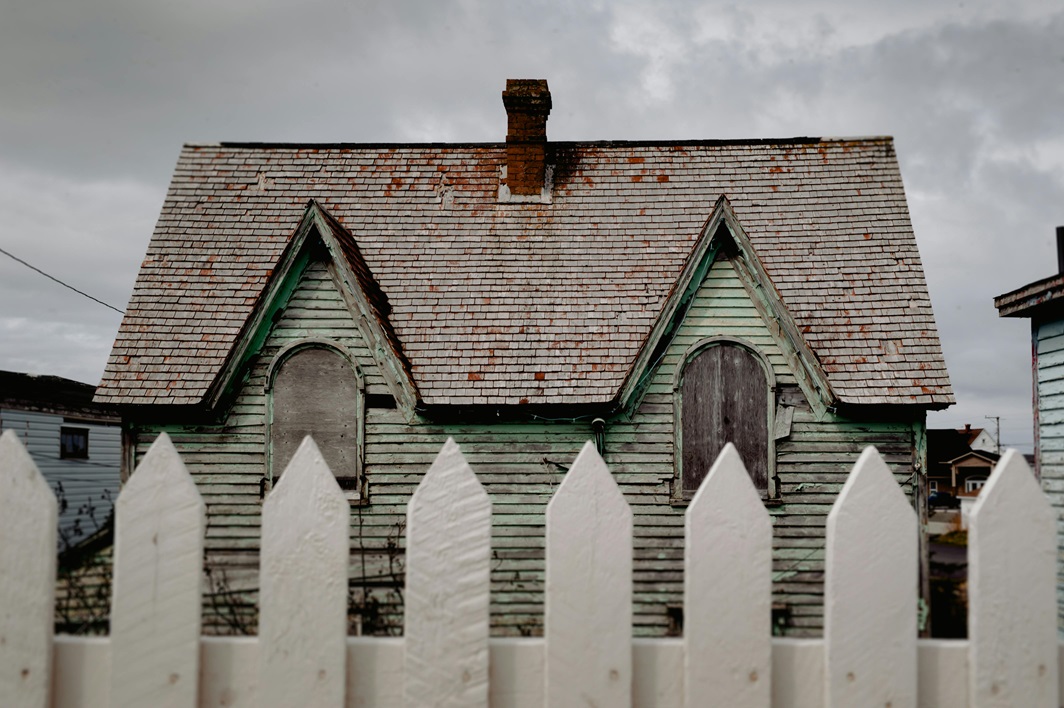 old roof on house roof in need of repair