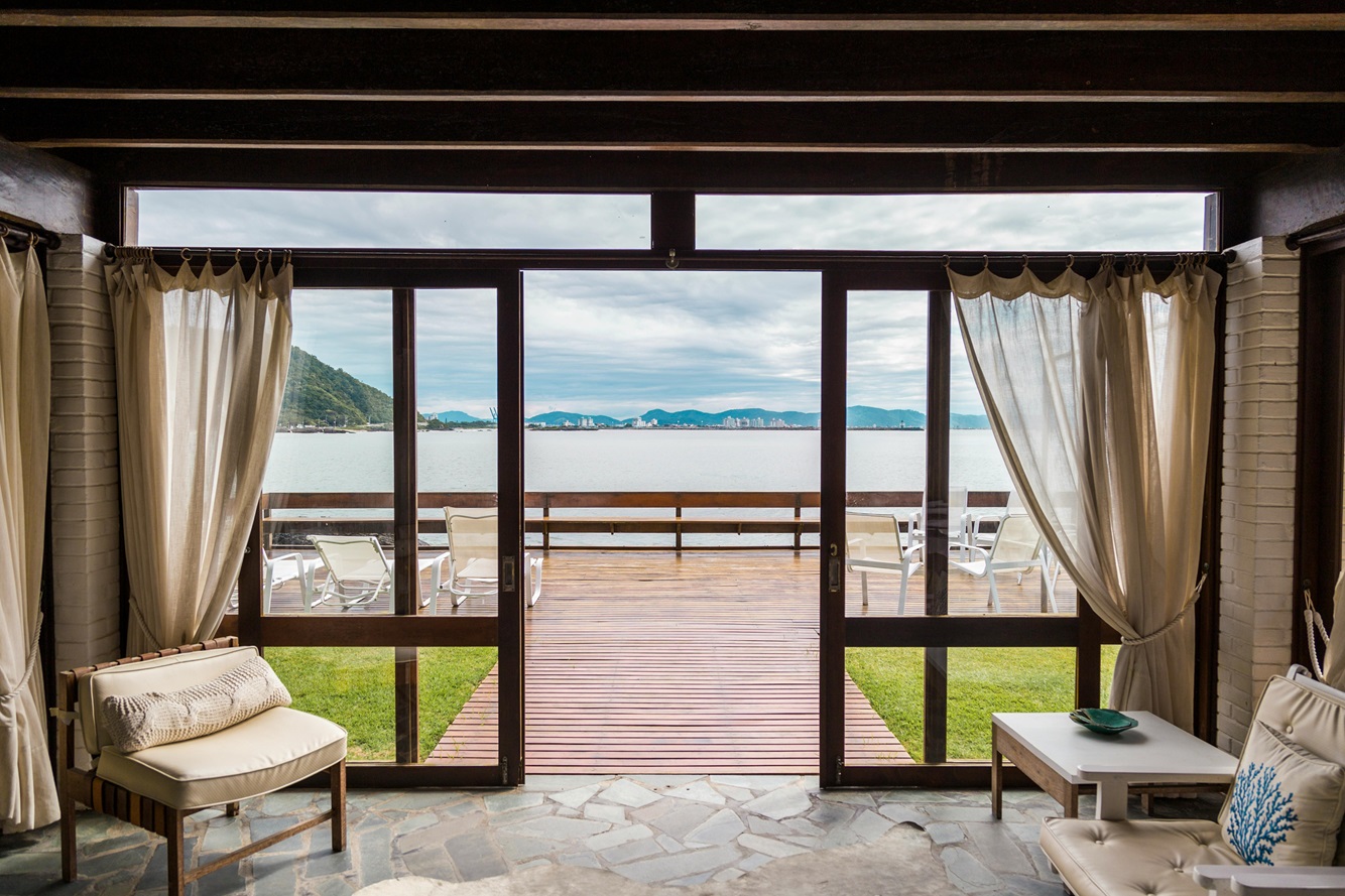 patio doors with view of water