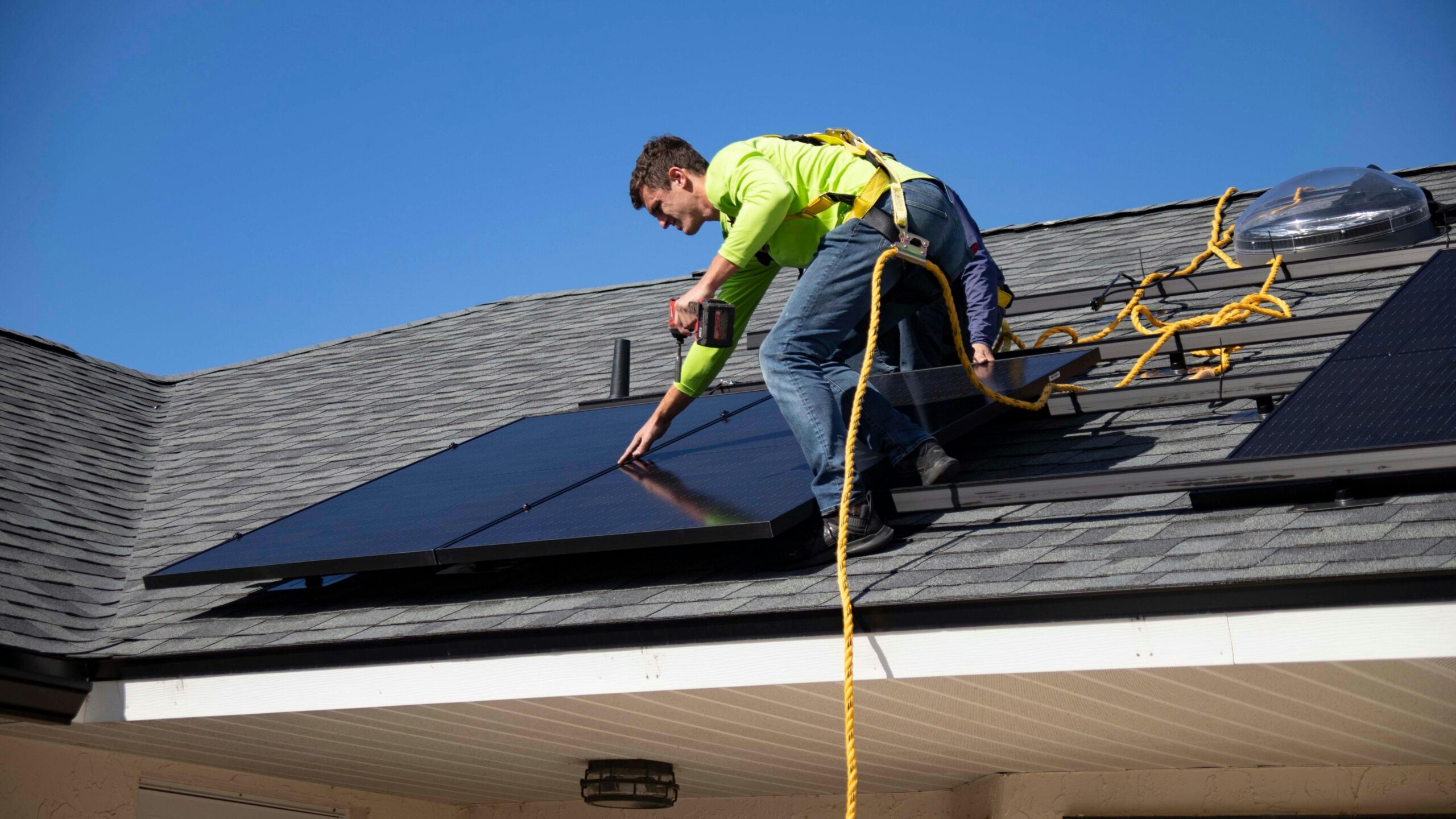 solar panel installation man installing solar panels on roof