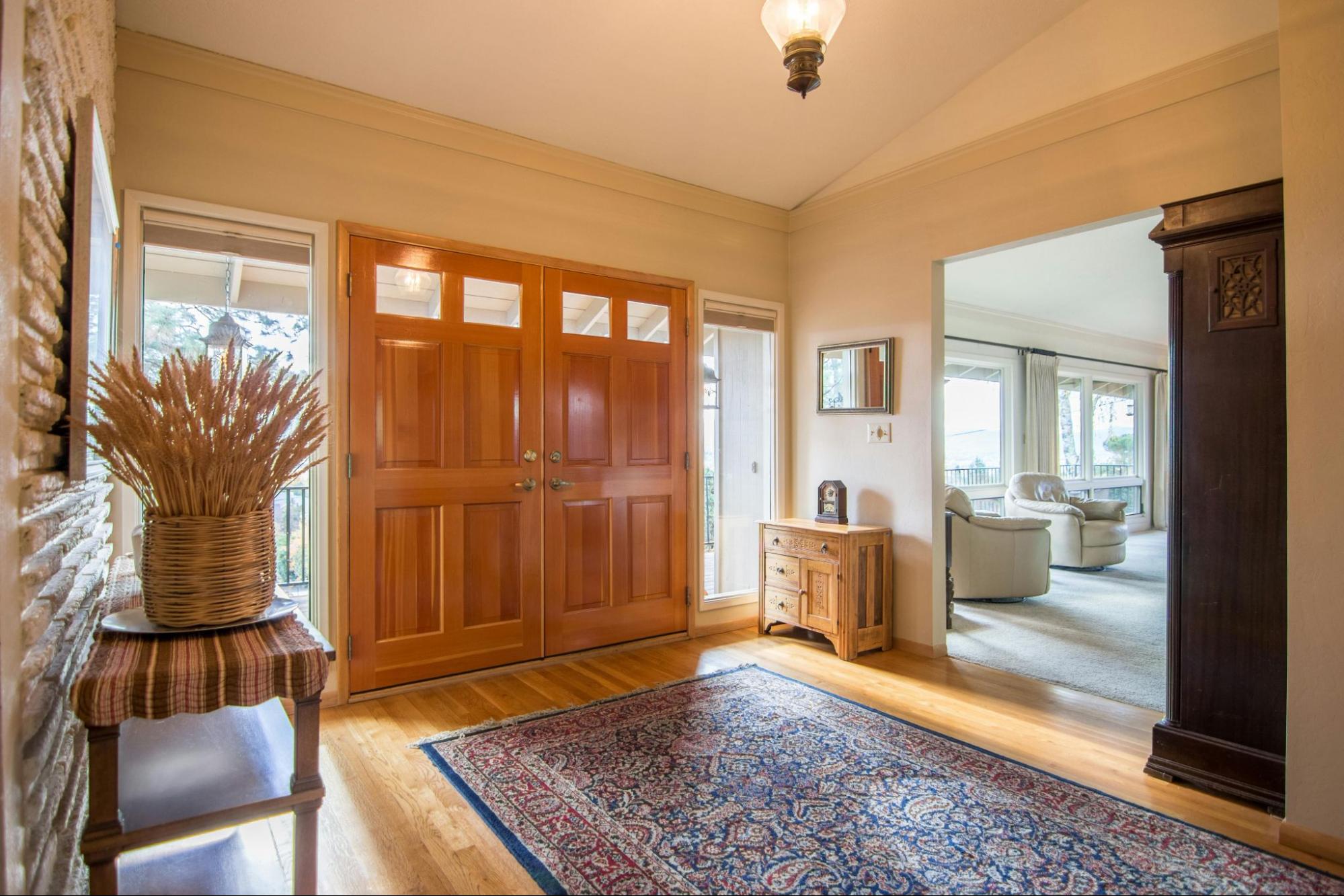 runner-rug-in-entryway beautiful home foyer with a large running rug in the doorway