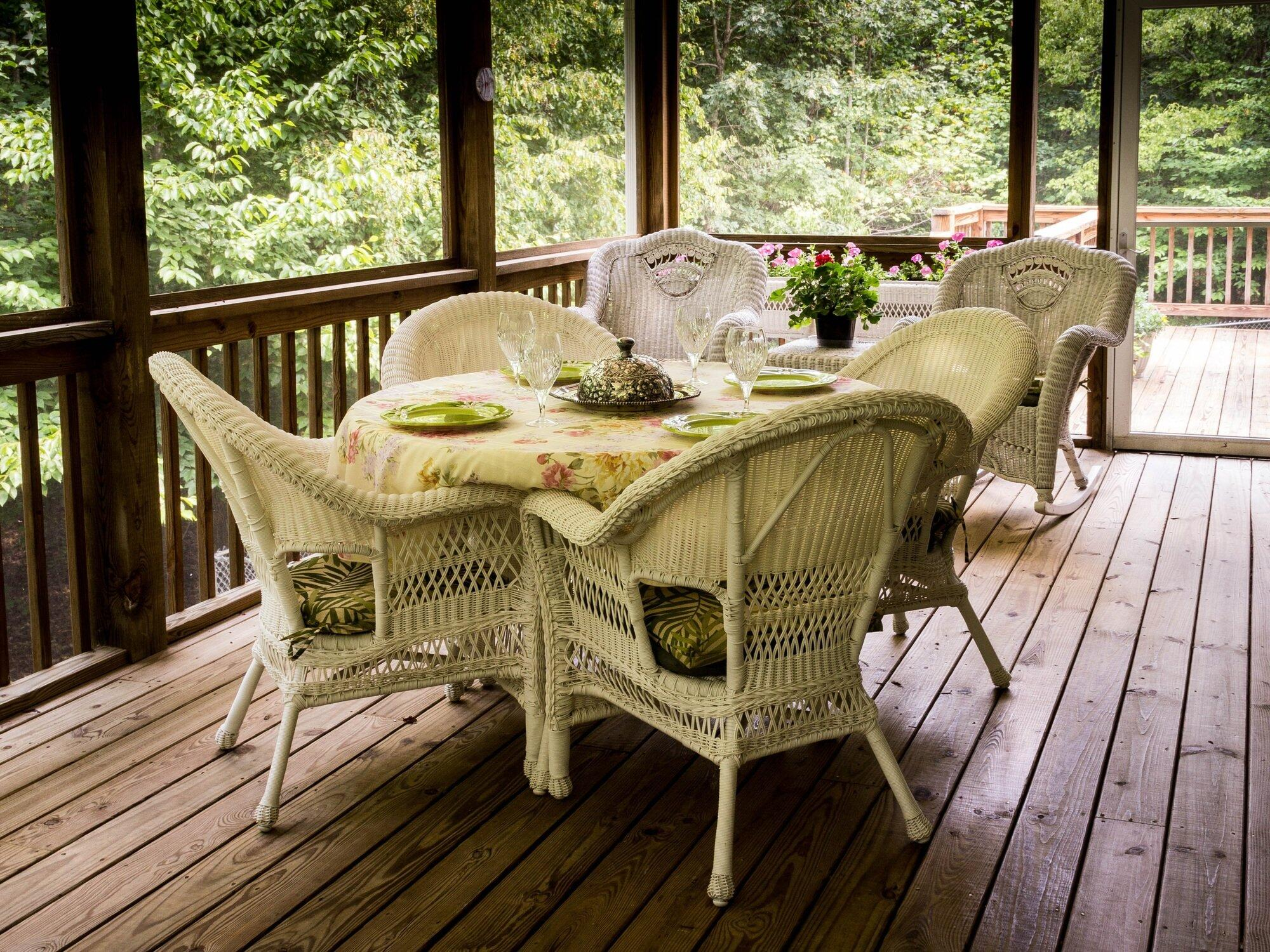 screeened porch screened porch with table and chairs