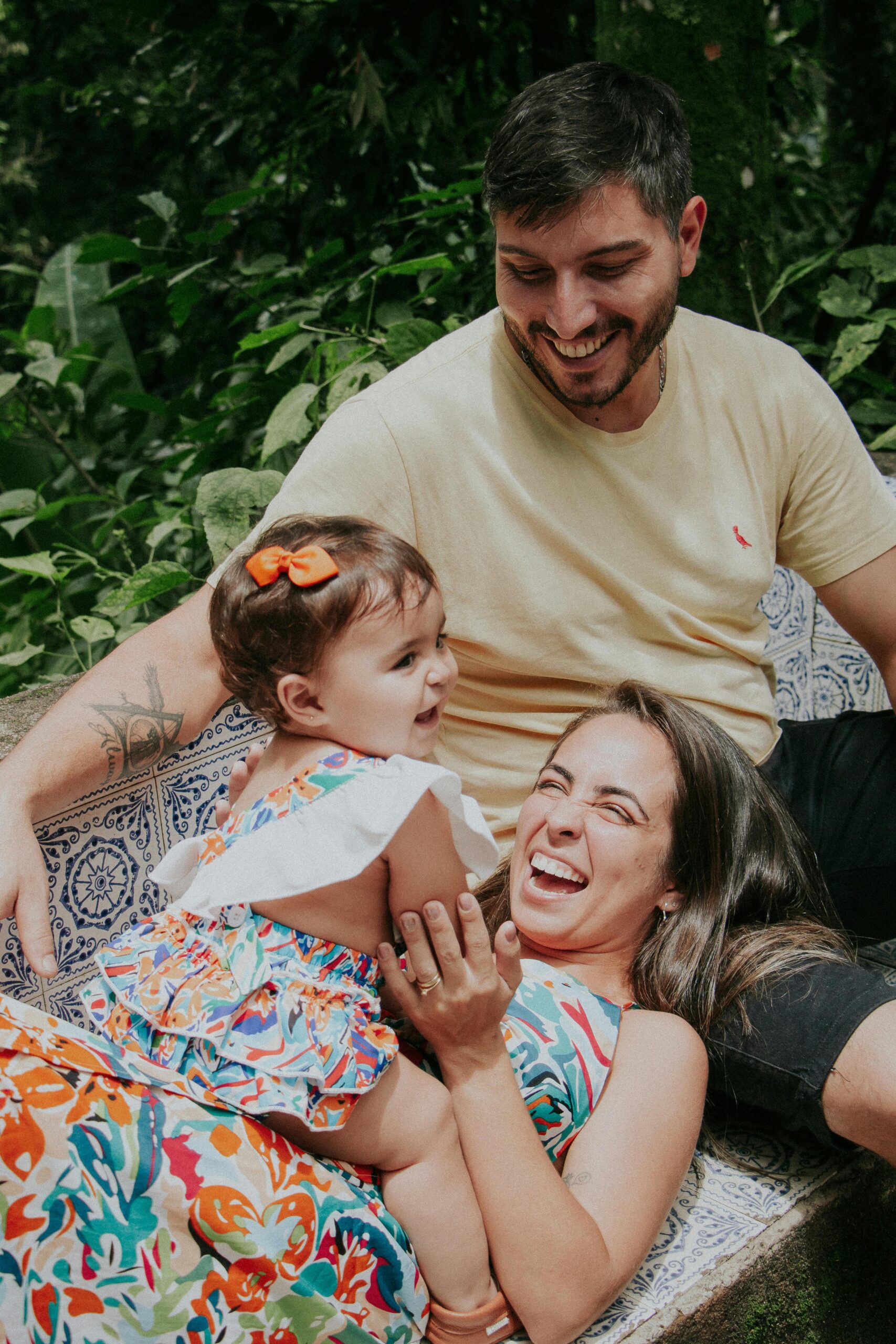 image of a family sitting together embracing eachother