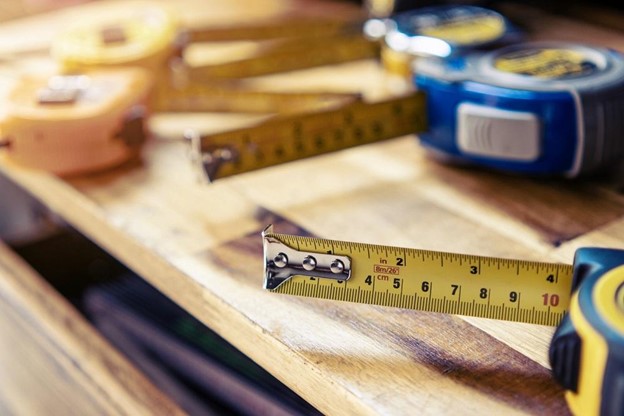 tape measure and lumber tape measure and lumber