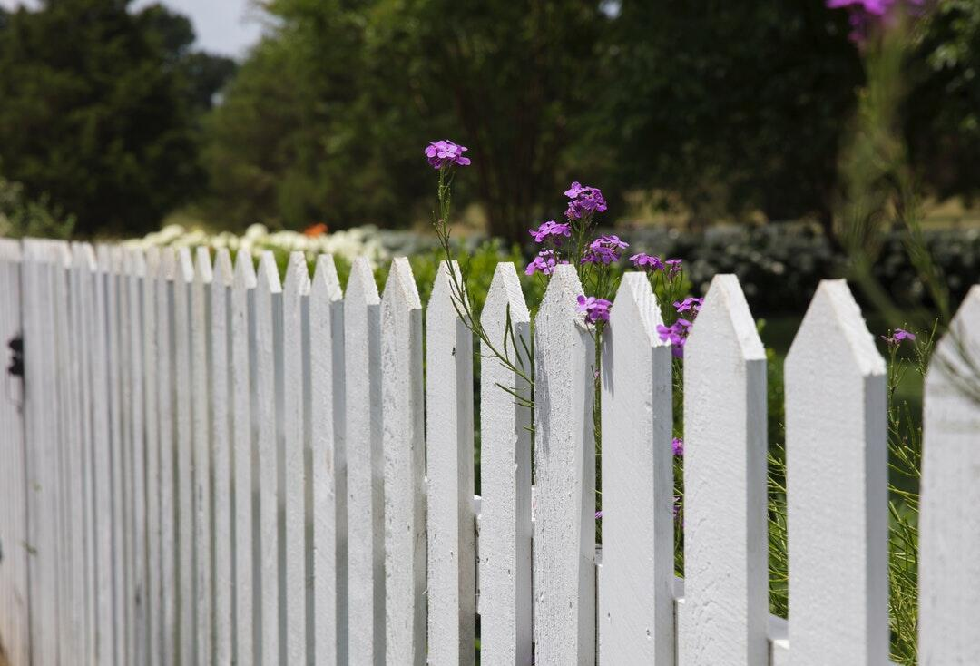 white picket fence around house